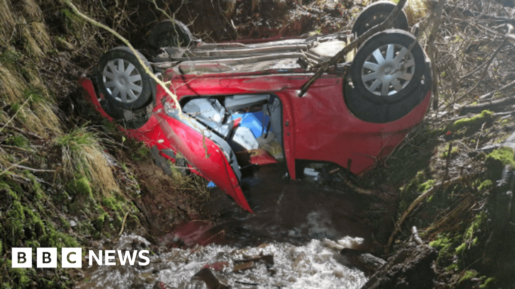 Driver Rescued After Car Submerges Upside Down in Stream in Powys