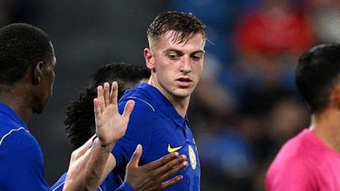 Liam Delap slaps hands with his team-mate Nicolas Jackson after scoring for Chelsea in pre-season
