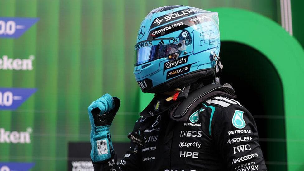 George Russell celebrates sprint pole at Zandvoort