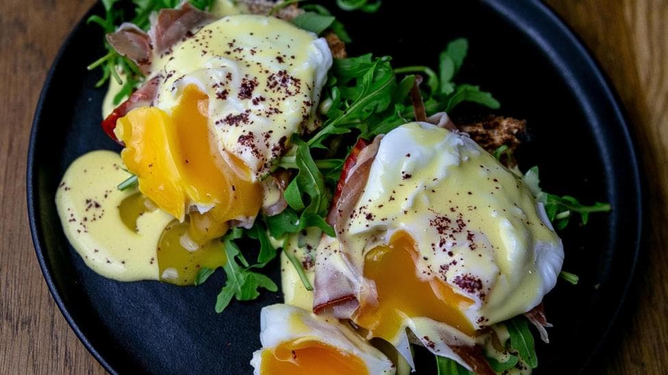 Plate with runny eggs
