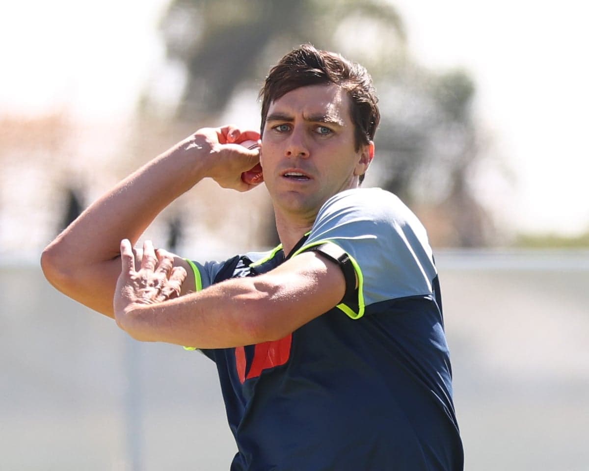 Pat Cummins warms up before Australia play Bangladesh on day one of the second Test in Mackay