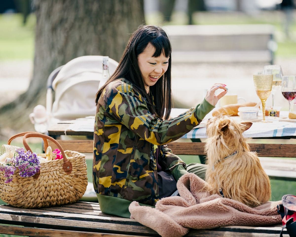 Grace Chow as Pamelia with little friend Big in Dog Park.