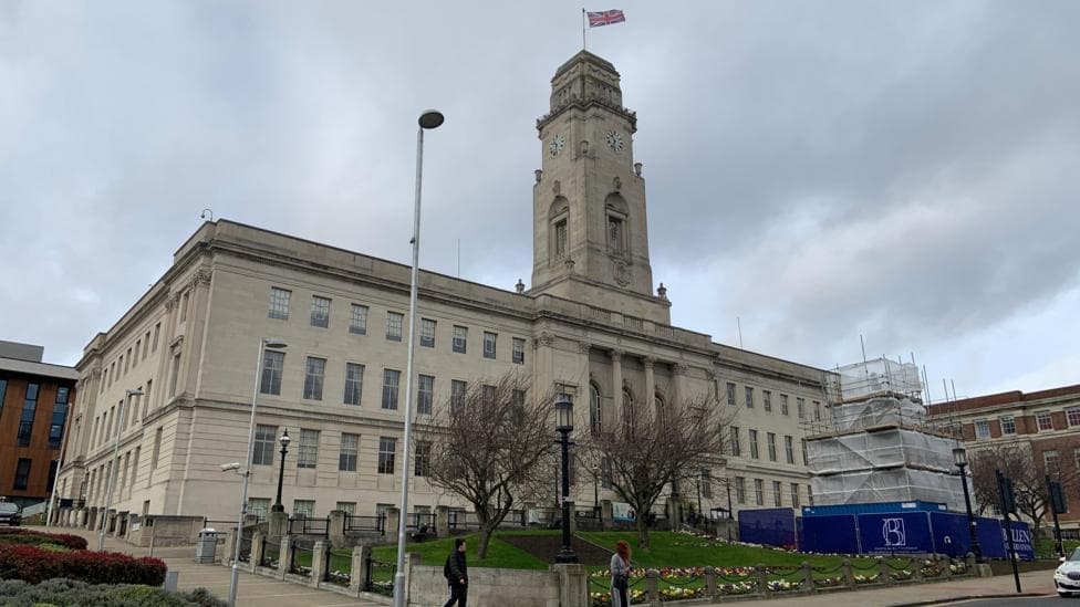 Barnsley Town Hall, a large, light-colored building constructed in a classical architectural style.