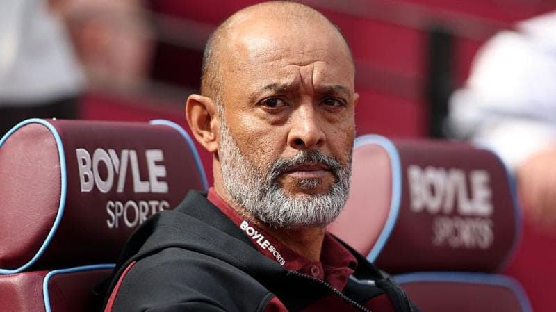 Nuno Espirito Santo sits in the dugout at West Ham's London Stadium