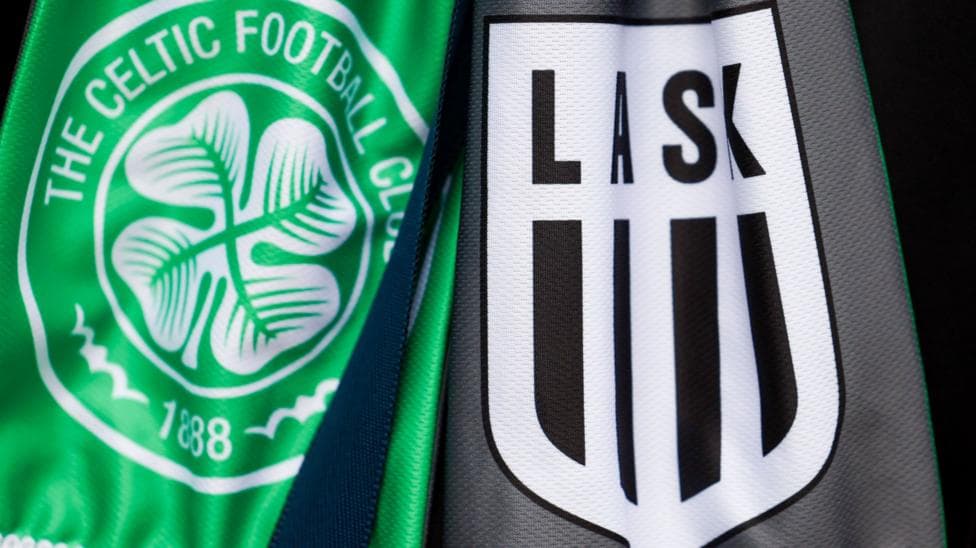 Close up of a green and white Celtic scarf and a black and white LASK scarf, featuring the logos of both clubs