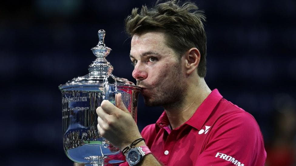 Stan Wawrinka kisses the trophy after winning the US Open in 2016