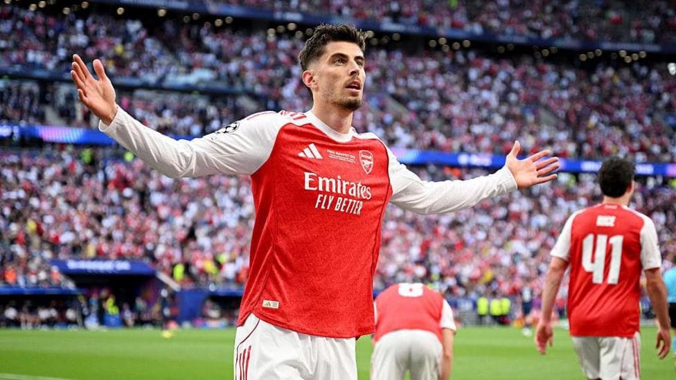Kai Havertz celebrating with his arms outstretched