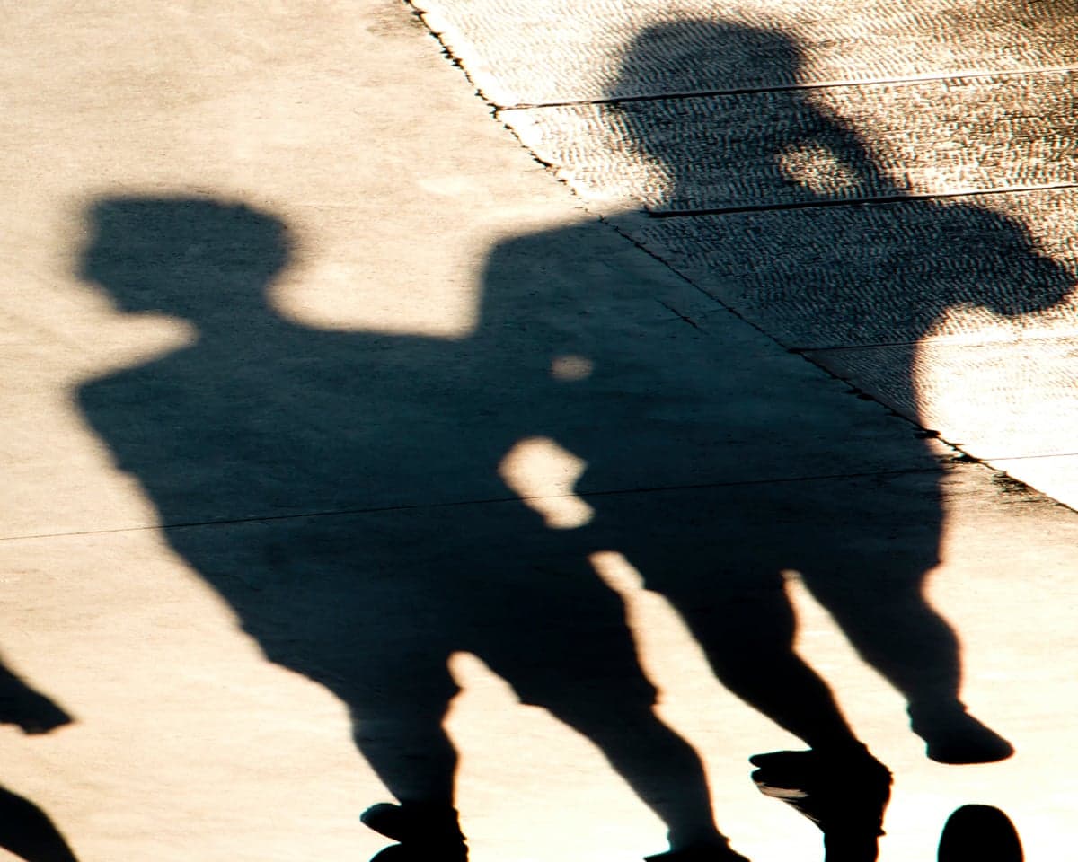 silhouettes of two children