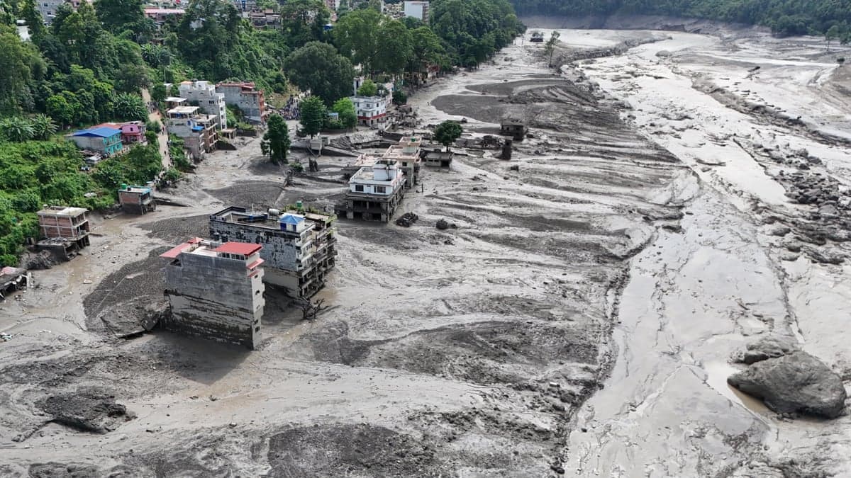 APTOPIX Nepal Flash FloodsA boy looks at the devastation caused by flash flooding along the Trishuli River in Nepal's Nuwakot district, Wednesday, Aug. 26, 2026. (AP Photo/Niranjan Shrestha)
