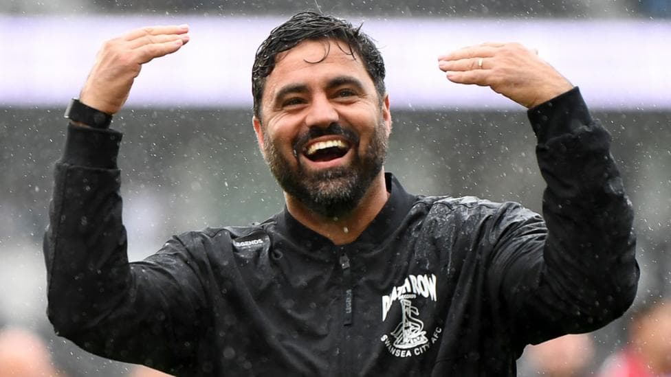 Vitor Matos celebrates Swansea's win at Derby County