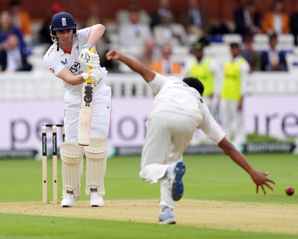 Dan Lawrence plays a shot straight back past Pakistan’s Khurram Shahzad