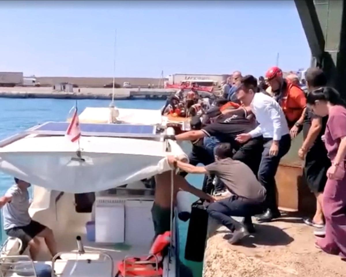 Rescue boats bring passengers to shore from capsized boat in northern Cyprus