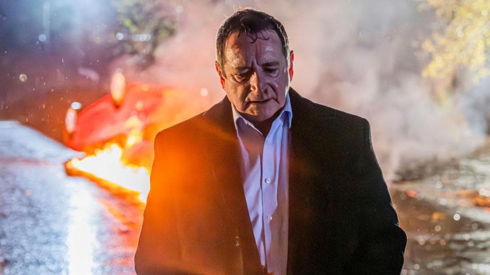 Image showing a bloodied Lenny Murdoch amidst a dramatic fire scene suggest the show's arch-villain is at the centre of the final episode
