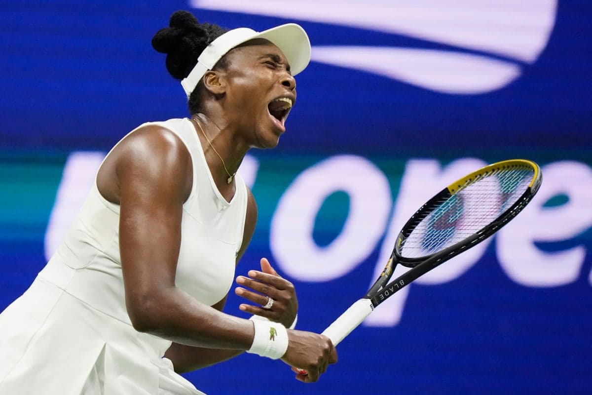 Venus Williams reacts during her first-round match against fellow American Sofia Kenin at the US Open early Monday morning in New York.