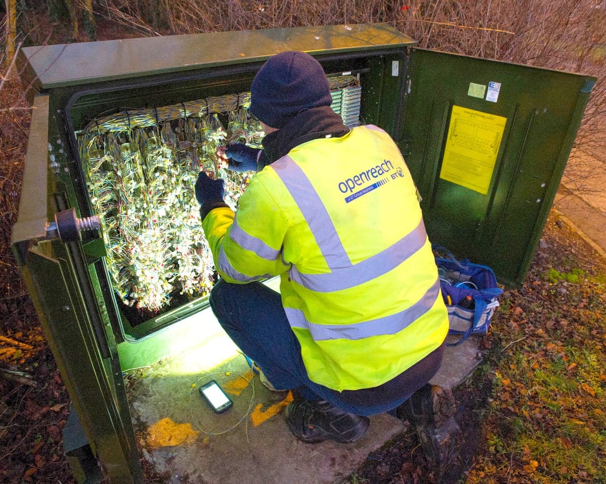 BT Openreach engineer works on upgrading a telephone exchange to superfast broadband