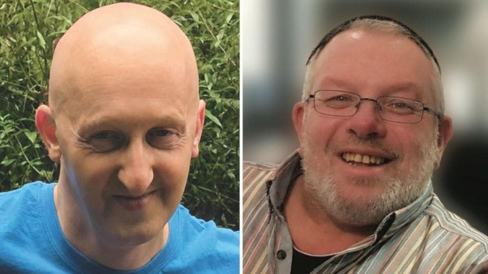 A composite image of of Adrian Daulby and Melvin Cravitz. The former is on the left and has a completely bald head. He is slightly tanned with a healthy complexion and is smiling happily in the head and shoulders shot, in which he wears a blue T-shirt. He is standing close to a bush, the green leaves of which cover the background. Mr Cravitz has a black skull cap and striped, button up shirt of many colours. He has rectangular, thin-rimmed glasses. He is also smiling and sports a short grey beard and moustache.