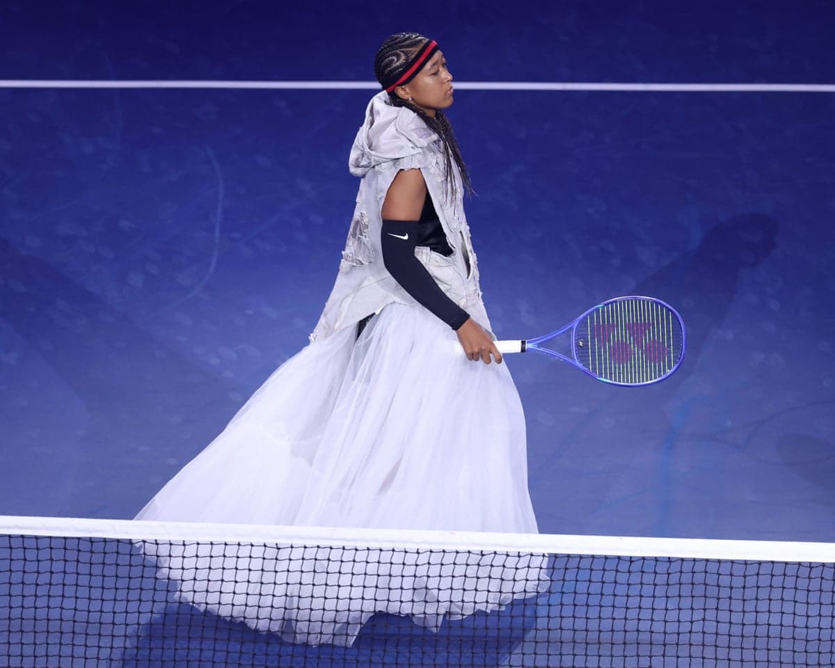 Naomi Osaka walks on to court at the US Open
