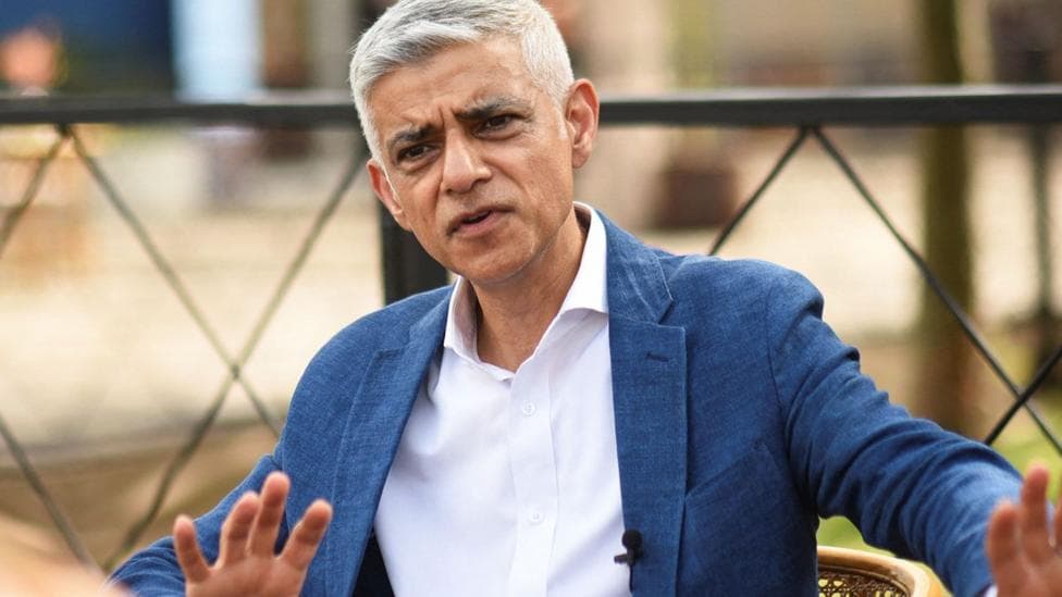 Sadiq Khan wearing a blue suit
