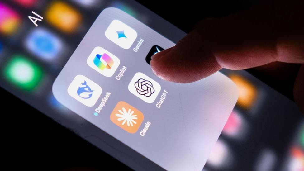 A thumb hovers over a phone screen, which shows the app icons for popular AI services including ChatGPT, Gemini and Claude