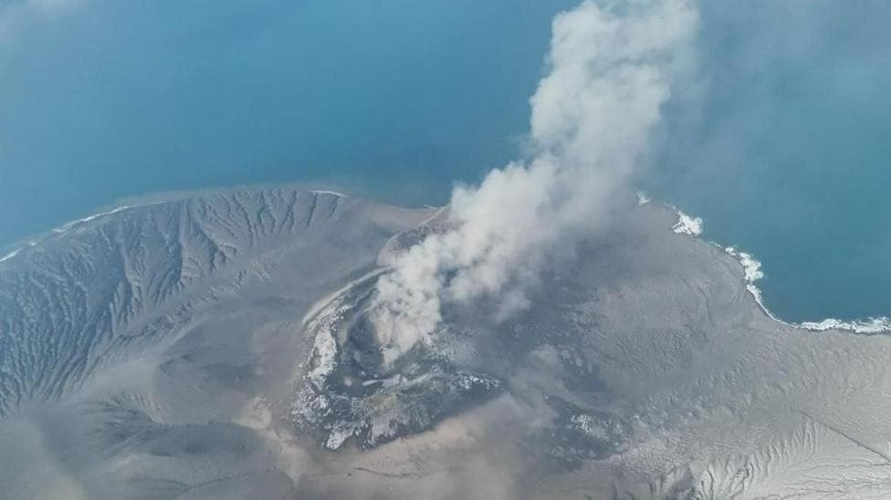 Mount Anak Krakatau spewing volcanic materials into the air following an eruption in Sunda Strait, Indonesia