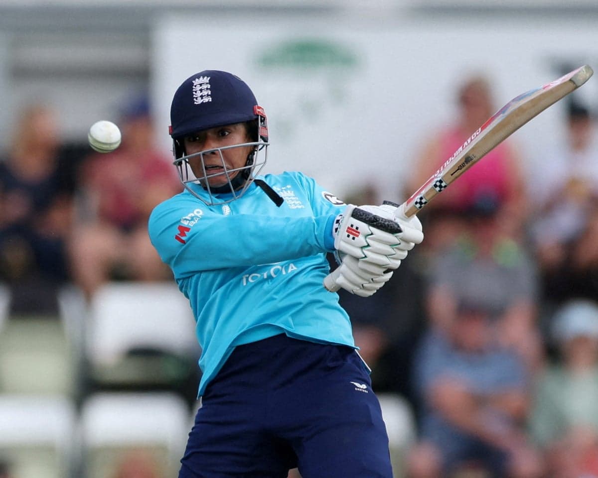 Sophia Dunkley hits the ball