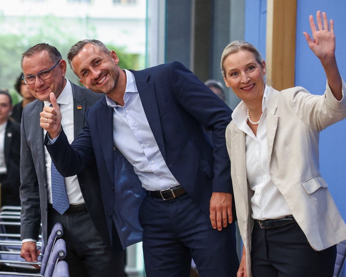 Far-right Alternative for Germany (AfD) party co-leaders Alice Weidel (right) and Tino Chrupalla left), and top candidate Ulrich Siegmund (centre) give a press conference on Monday