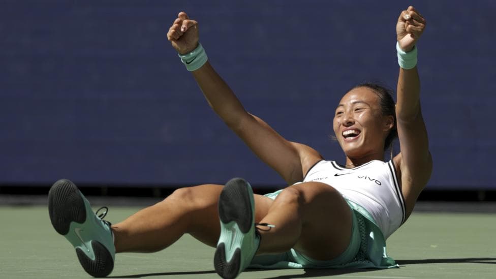 Zheng Qinwen drops to the floor in celebration