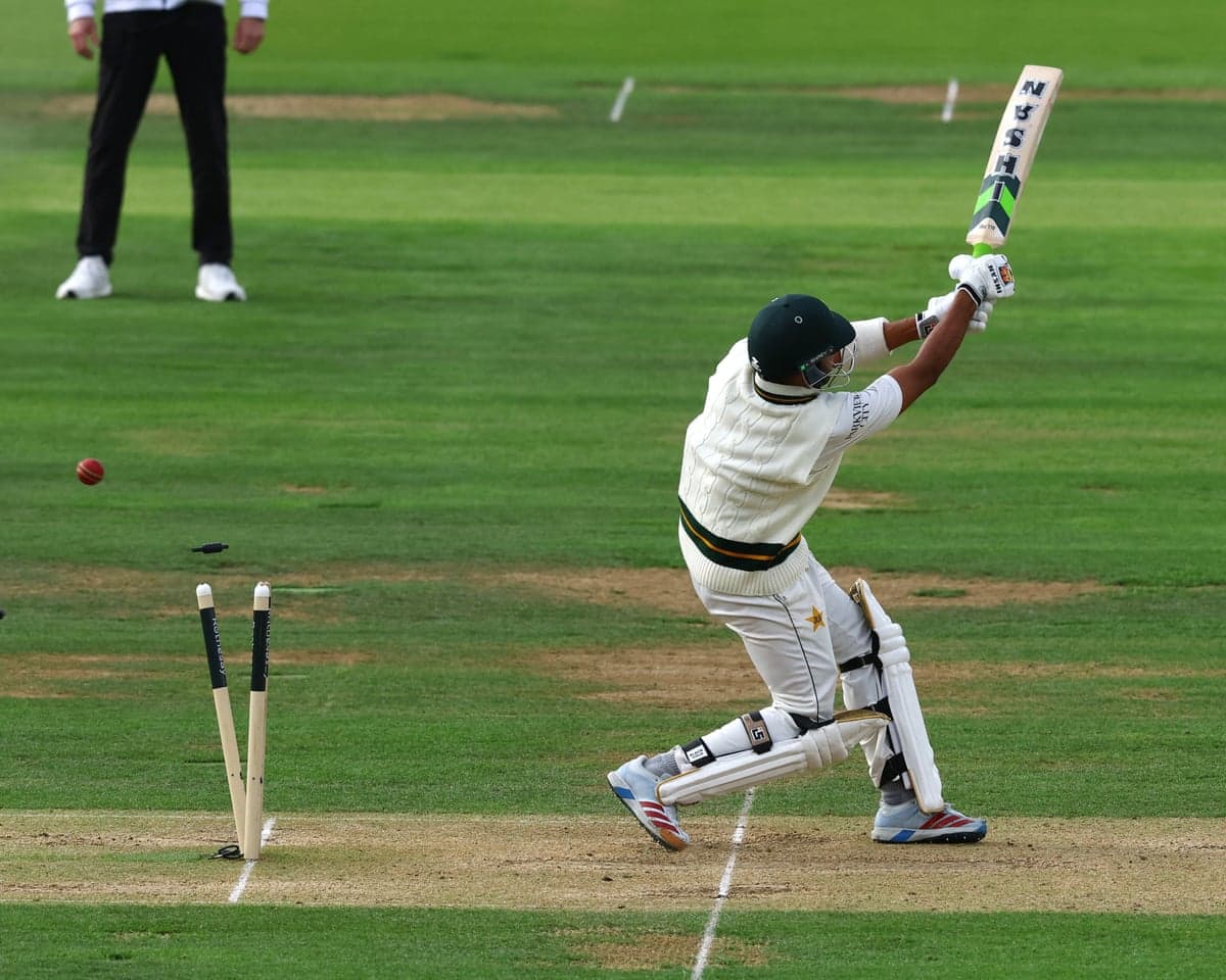 Pakistan's Khurram Shahzad swings for the fences at Lord’s only to be bowled by England's Josh Tongue