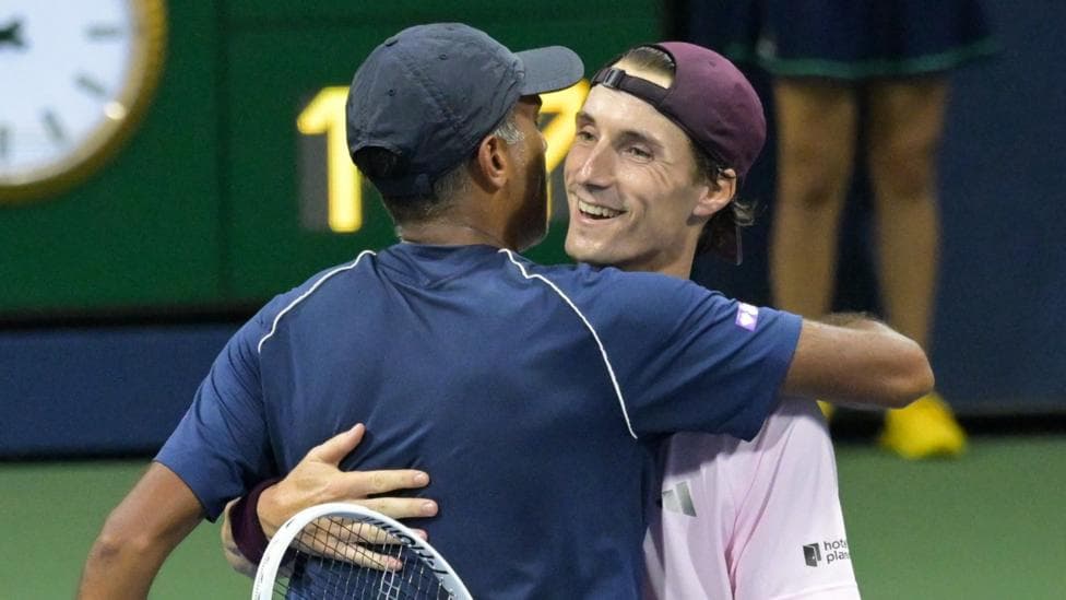 Joe Salisbury (right) hugs doubles partner Rajeev Ram