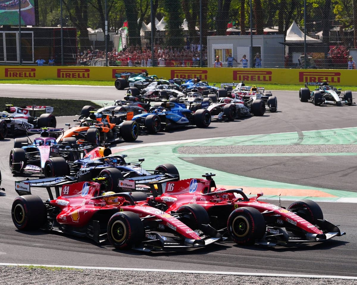 Ferrari’s Lewis Hamilton (left) and teammate Charles Leclerc come together into the first chicane at the Italian Grand Prix.