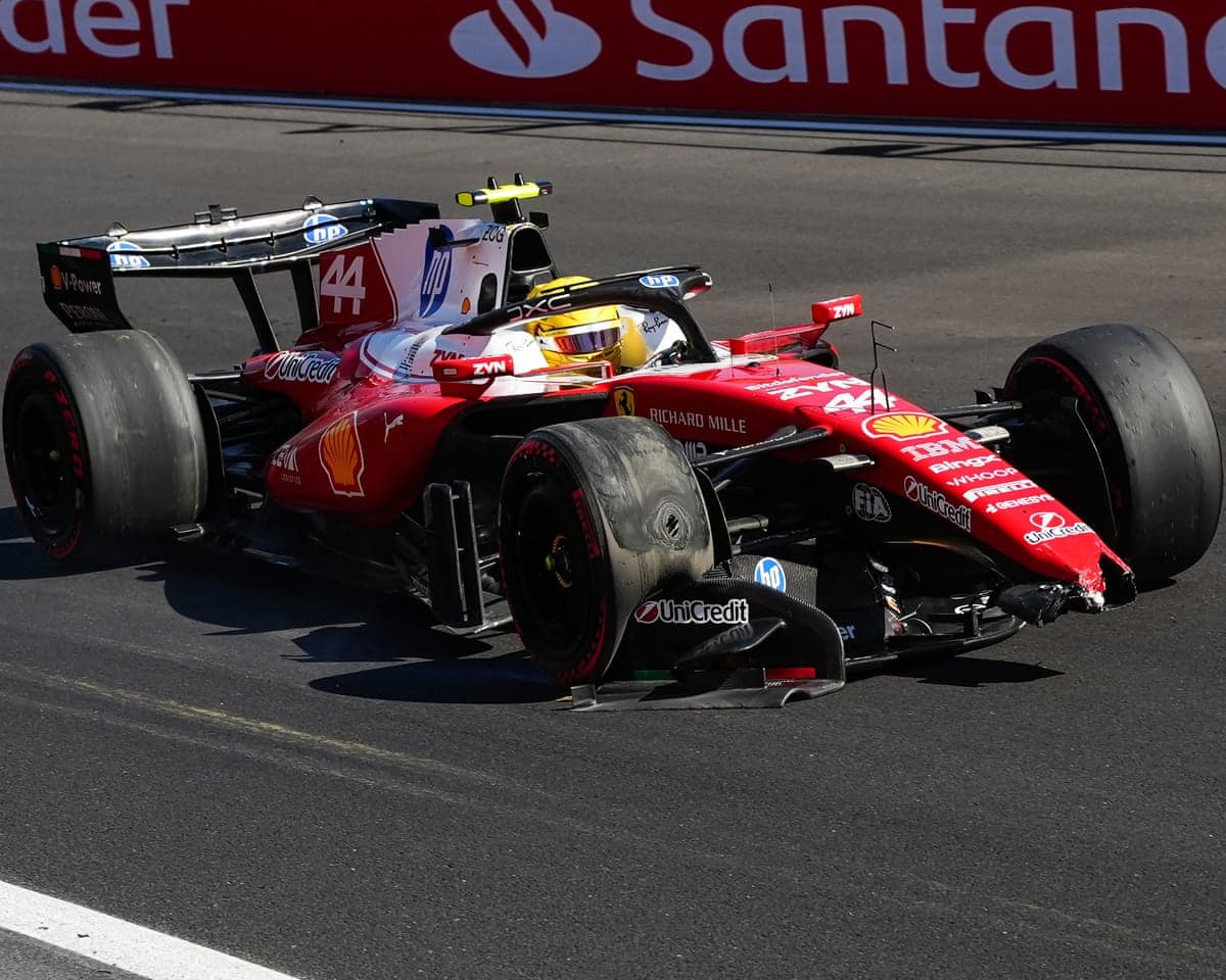 Lewis Hamilton drives with a broken wing after crashing during free practice at the Madring