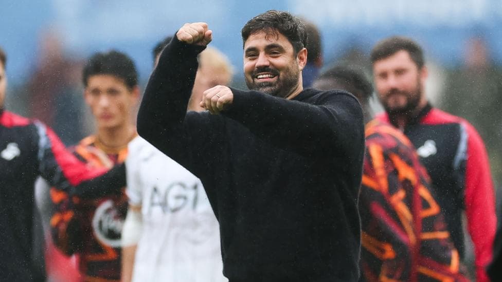 Vitor Matos celebrates after Swansea's victory over Burnley