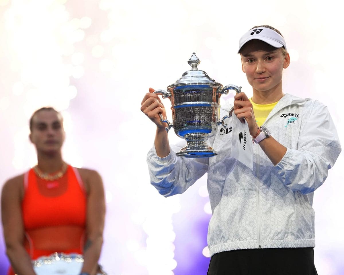 Elena Rybakina shows off the trophy in New York after beating rival Aryna Sabalenka