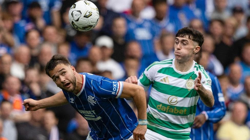 Rangers' Nicolas Raskin (L) and Celtic's Colby Donovan in action during a Premier Sports Cup Quarter-Final match between Rangers and Celtic at Ibrox.