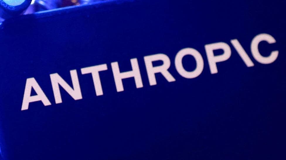 Anthropic's name in its stylized font against a dark blue computer screen.
