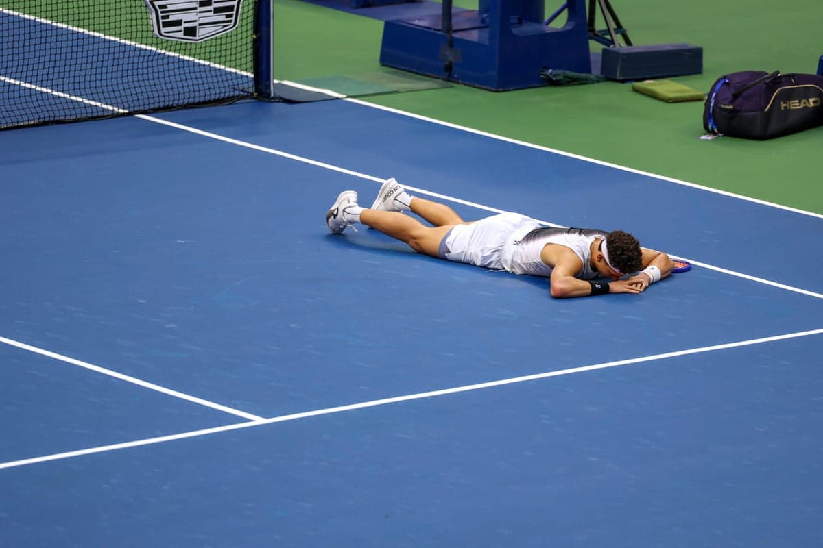 Ben Shelton sprawled out on the court during his men’s singles final defeat against Alexander Zverev