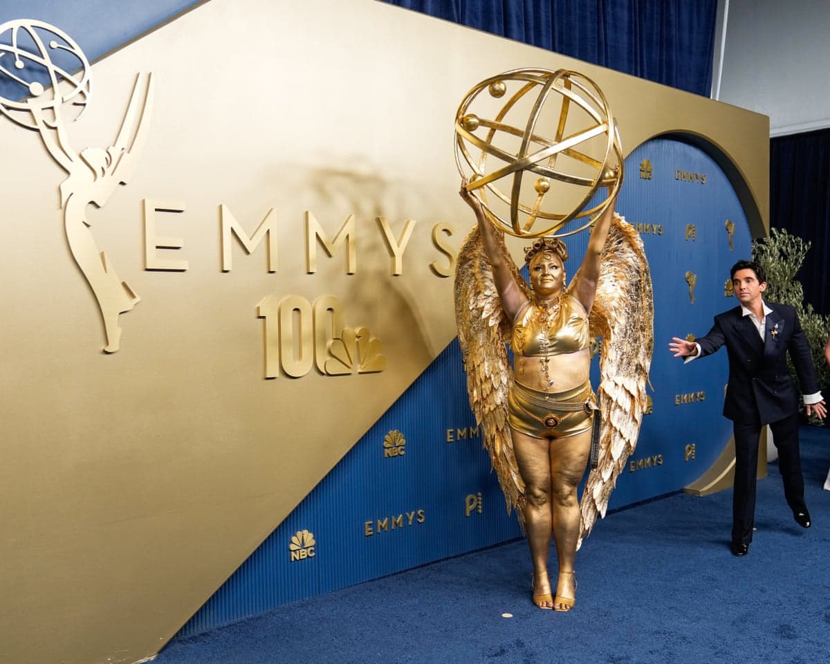 Hacks star Megan Stalter and Paul W Downs arrive at the 78th Emmy Awards.
