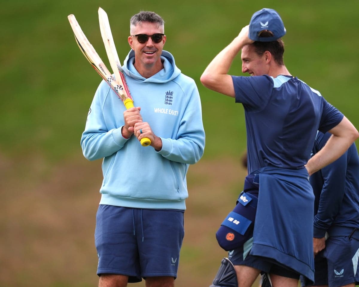 England specialist mentor Kevin Pietersen holds a broken bat as he speaks with Harry Brook