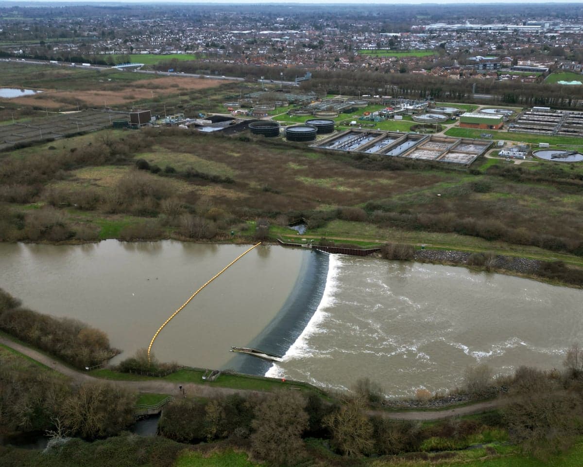 A drone photo shows a sewage treatment works, next to the River Thames in Slough