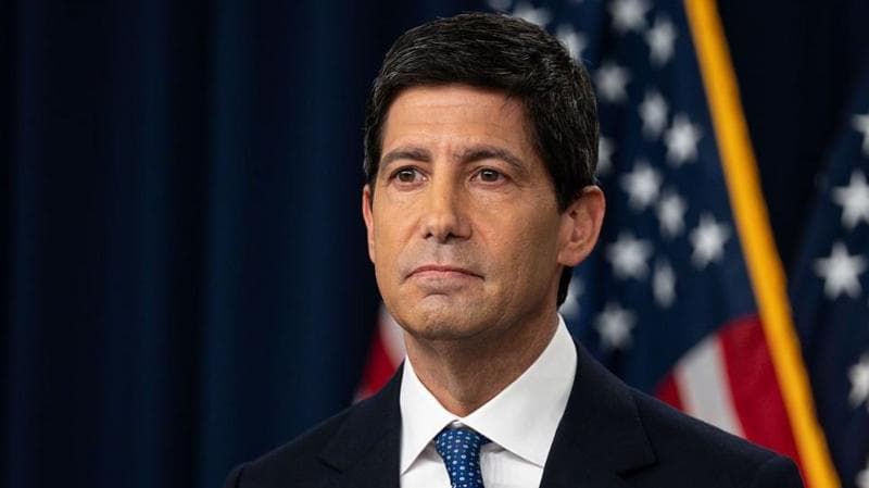 Kevin Warsh, chairman of the Federal Reserve, taking questions at a press conference in Washington DC on 16 September. He is wearing a dark navy blue suit with a white shirt and blue-spotted tie.