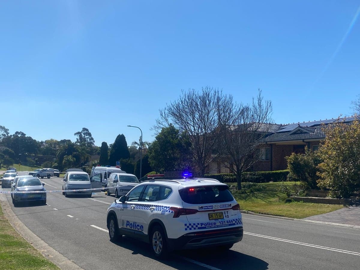 Police vehicles at the crime scene in Glen Alpine