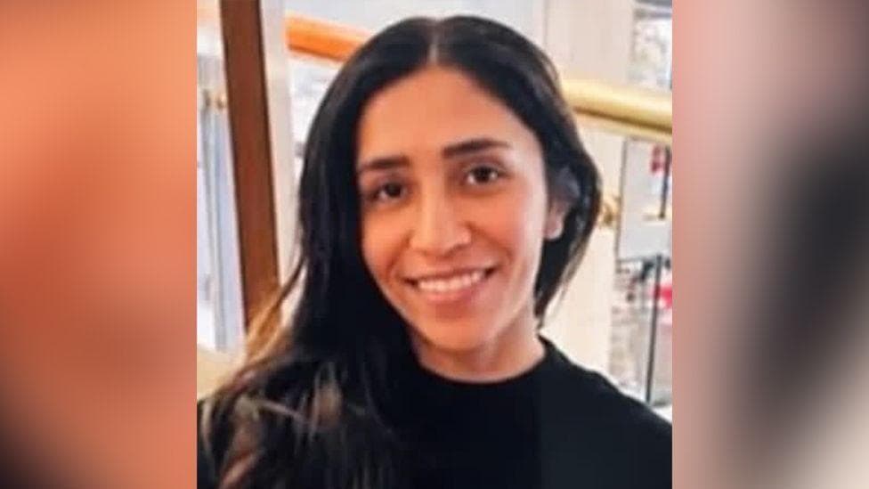 A head and shoulders image of Nusrat Osman wearing a black top.