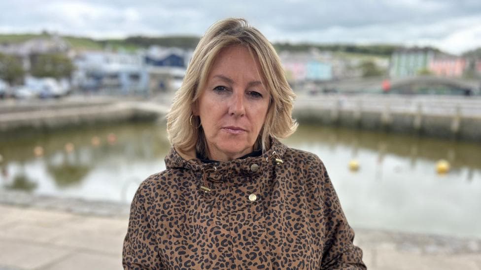 Cllr Elizabeth Evans standing on the harbour in Aberaeron
