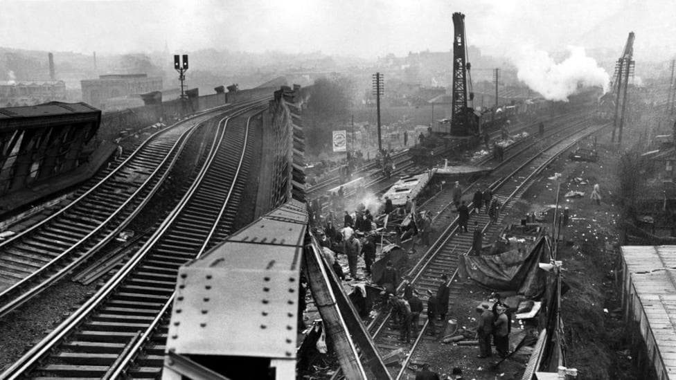 Scene of the Lewisham rail crash in 1957. An Express train ran into a stationary Electric train between Lewisham and St John's stations, London on 4th December 1957. The collision occurred underneath a loop line bridge, and the force of the collision catapulted the carriages into the air and brought part of the iron bridge weighing hundreds of tons, crushing down on the trapped passengers.