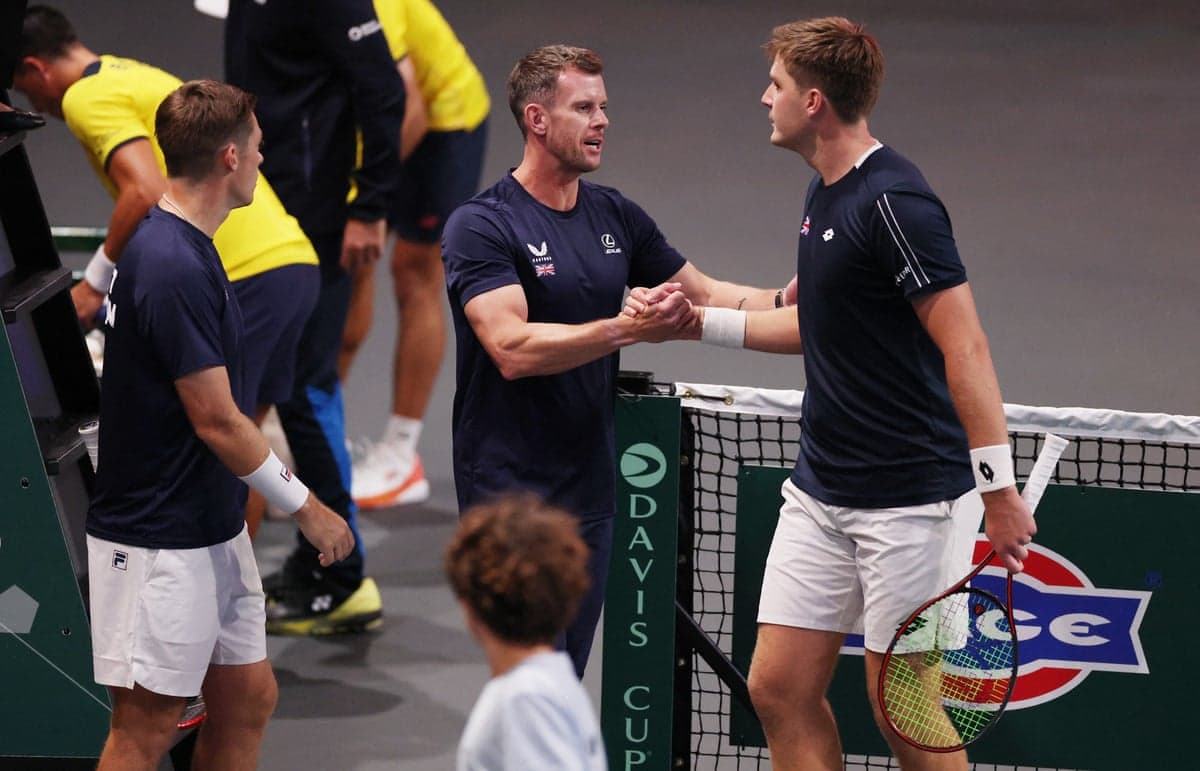 Henry Patten and Neal Skupski celebrate with their captain Leon Smith after beating Ecuador 3-0
