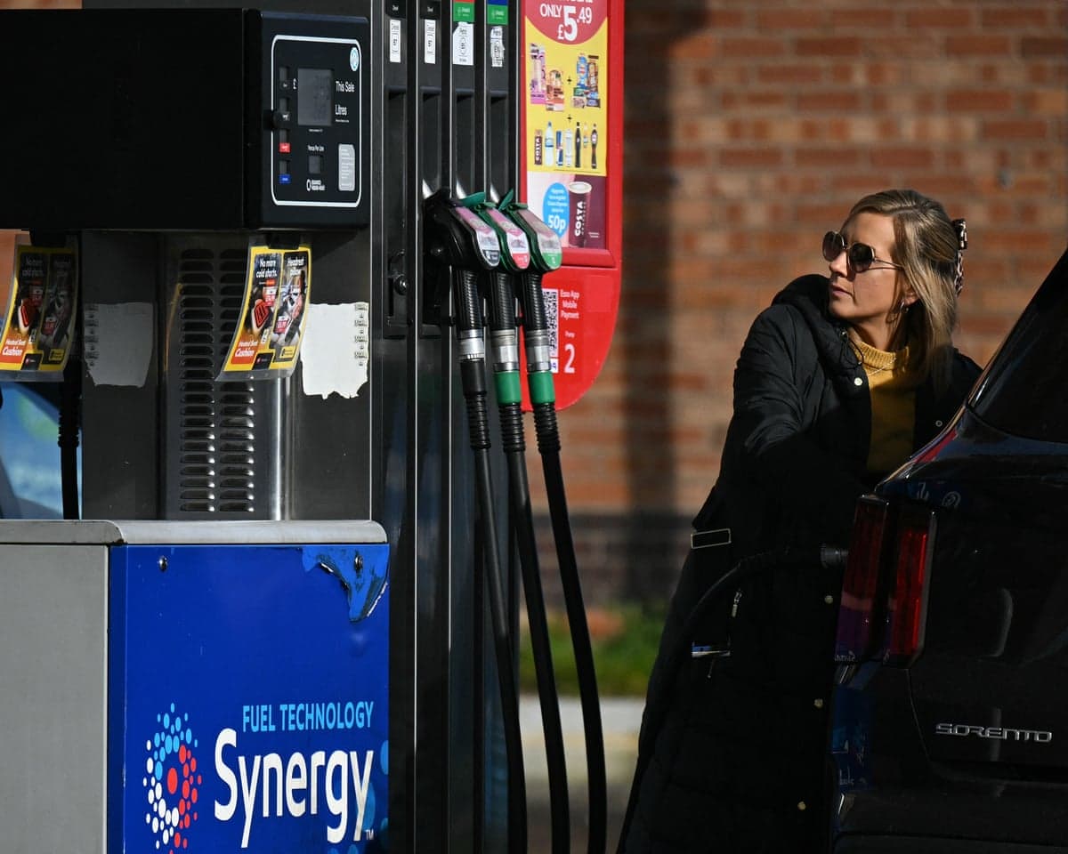 A motorist refuels a vehicle with diesel fuel at an Esso petrol station in Lutterworth, near Rugby in central England.