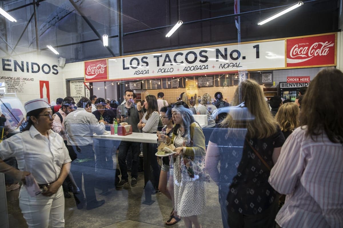 customers eat at a busy taco chain