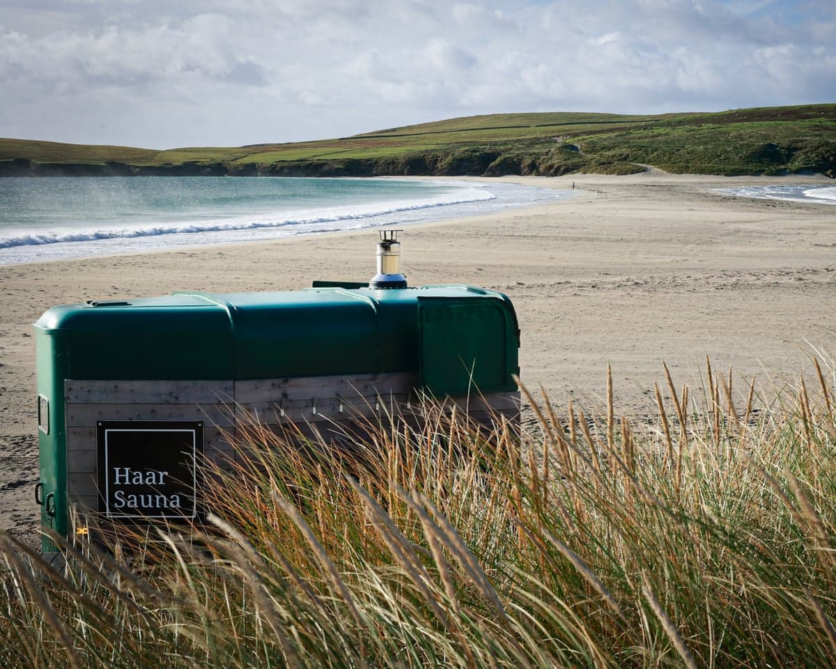 Beach sauna on a wide sandy beach