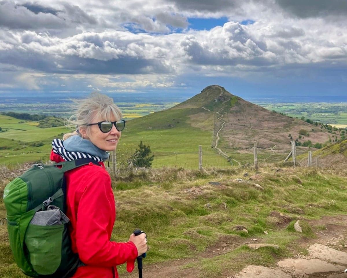 Annabel Abbs passing Roseberry Topping while walking the Cleveland Way.