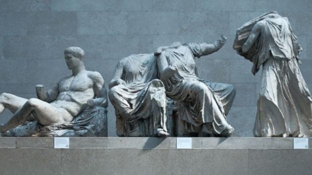 Some of the Parthenon sculptures in the British Museum. The sculptures are damaged, with some missing limbs and heads